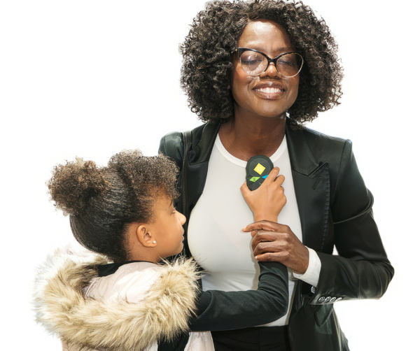 Viola Davis and her daughter holding coMra Palm