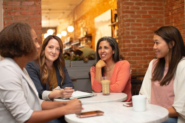 Women talking about estrogen dominance symptoms.